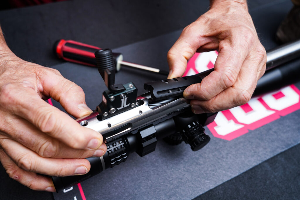 A firearm being assembled
