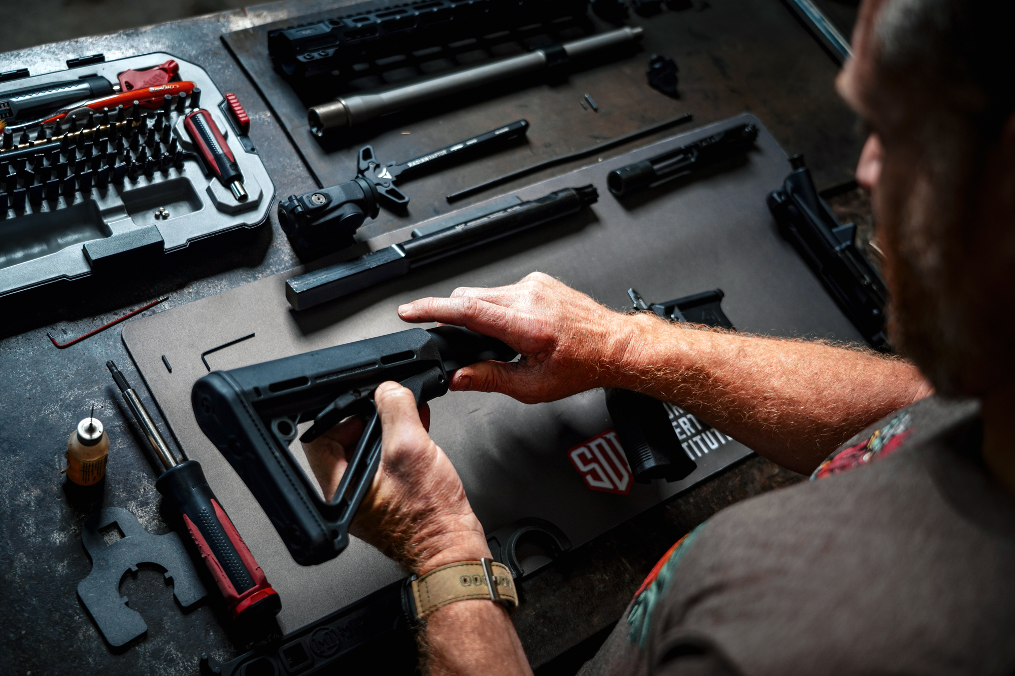 A firearm being assembled